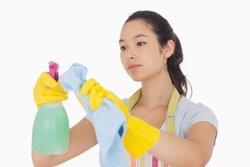 Chelsea office cleaning team sanitizing meeting room surfaces