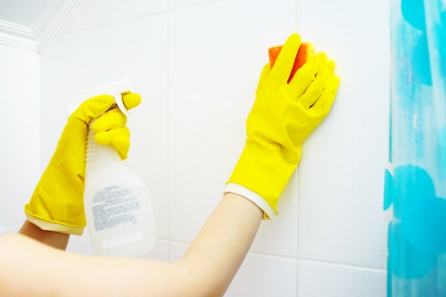 Experienced cleaner in Chelsea preparing a polished living space